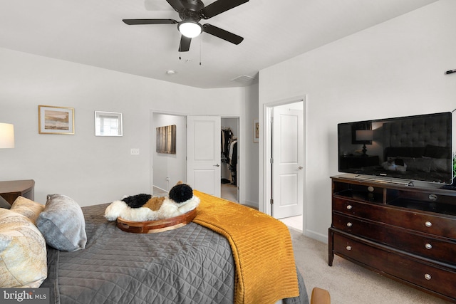 7204 Wood Trail Dr, Lanham, MD 20706 - bedroom featuring a closet, light colored carpet, a ceiling fan, a spacious closet, and baseboards