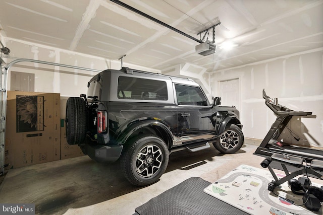 7204 Wood Trail Dr, Lanham, MD 20706 - garage featuring a garage door opener