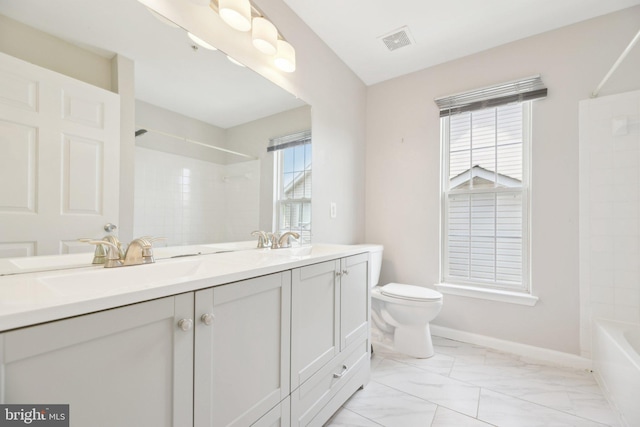 bathroom with marble finish floor, double vanity, visible vents, toilet, and a sink