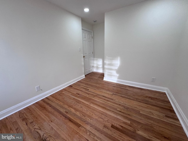 110 N Mount Olivet Ln, Baltimore, MD 21229 - empty room featuring wood finished floors, baseboards, and recessed lighting