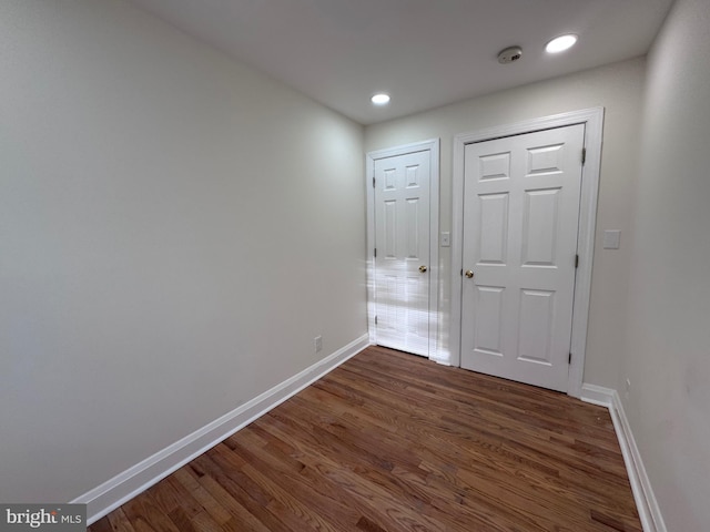 110 N Mount Olivet Ln, Baltimore, MD 21229 - interior space featuring baseboards, dark wood-style floors, and recessed lighting