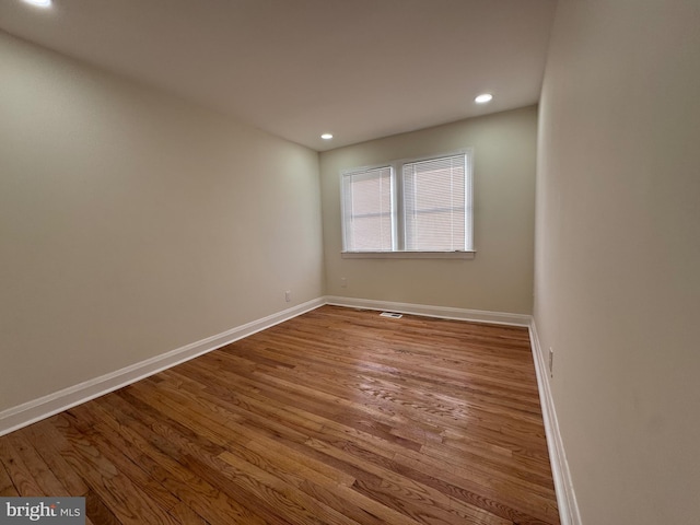 110 N Mount Olivet Ln, Baltimore, MD 21229 - spare room with recessed lighting, visible vents, baseboards, and wood finished floors