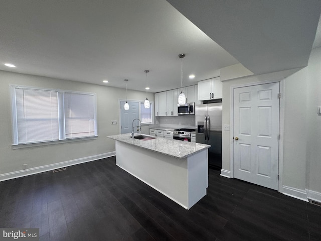 110 N Mount Olivet Ln, Baltimore, MD 21229 - kitchen with baseboards, recessed lighting, white cabinetry, appliances with stainless steel finishes, and a sink