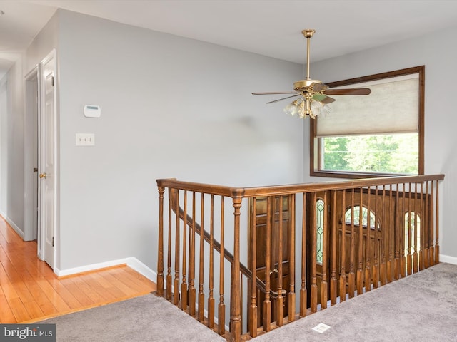 1161 Bacon Ridge Rd, Crownsville, MD 21032 - corridor featuring baseboards, an upstairs landing, and wood finished floors