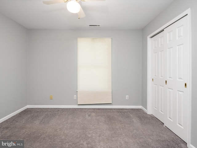1161 Bacon Ridge Rd, Crownsville, MD 21032 - unfurnished bedroom featuring carpet floors, a closet, baseboards, and a ceiling fan