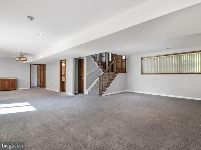 1161 Bacon Ridge Rd, Crownsville, MD 21032 - unfurnished living room with baseboards, stairs, and carpet flooring