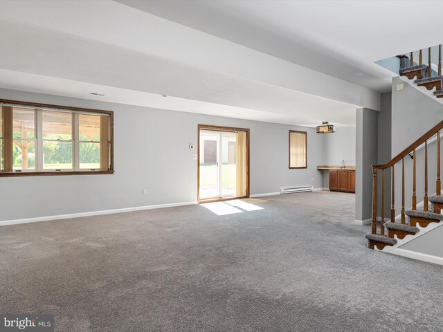1161 Bacon Ridge Rd, Crownsville, MD 21032 - unfurnished living room featuring a baseboard radiator, stairway, carpet floors, baseboards, and a sink