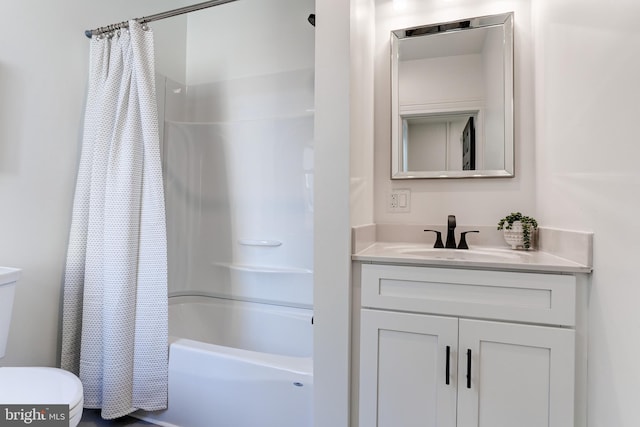 bathroom with vanity, shower / bathtub combination with curtain, and toilet