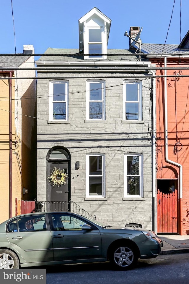 view of front of house with cooling unit