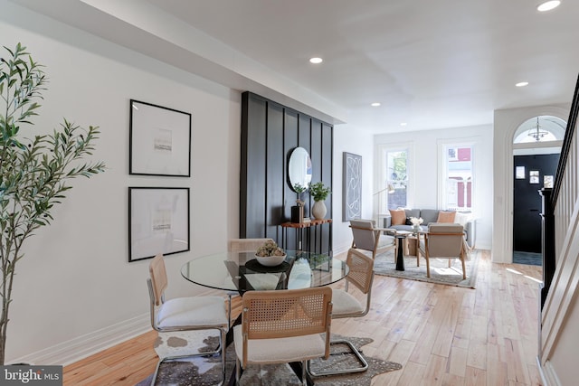 dining area featuring recessed lighting, light wood-style floors, and baseboards