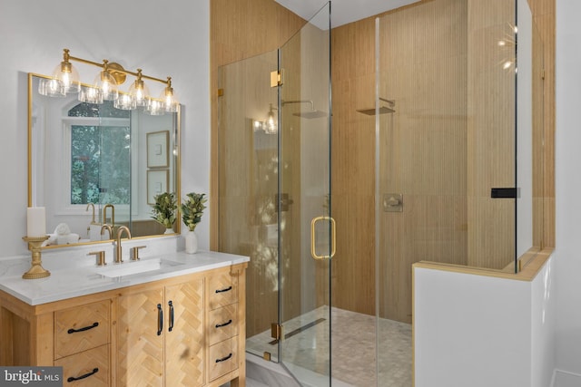 bathroom featuring vanity and a stall shower