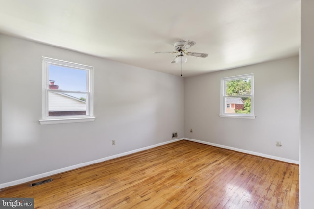 8601 Pretoria Ct, Clinton, MD 20735 - unfurnished room featuring visible vents, light wood-style flooring, baseboards, and ceiling fan