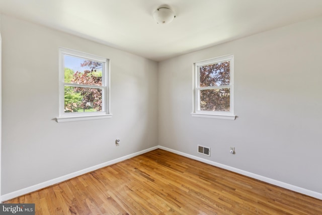 8601 Pretoria Ct, Clinton, MD 20735 - unfurnished room featuring baseboards, light wood-style flooring, and visible vents
