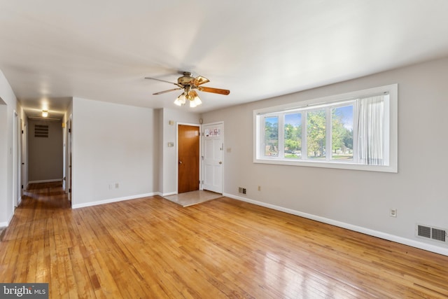 8601 Pretoria Ct, Clinton, MD 20735 - unfurnished room featuring baseboards, a ceiling fan, visible vents, and light wood-style floors