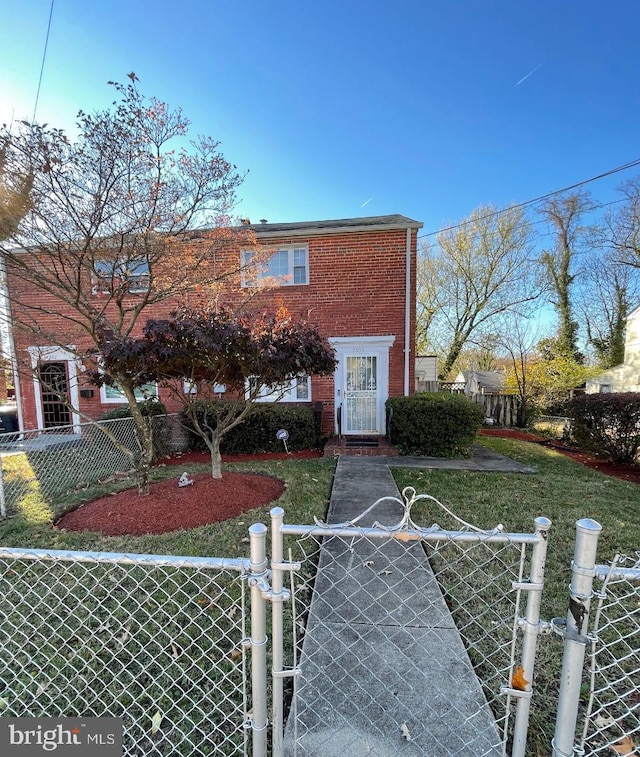2305 Houston St, Suitland, MD 20746 - view of front of house featuring brick siding and a gate