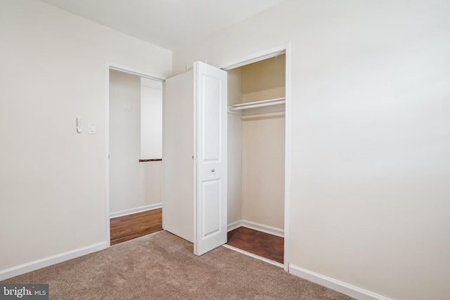2305 Houston St, Suitland, MD 20746 - unfurnished bedroom with carpet floors and a closet