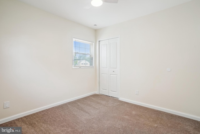 2305 Houston St, Suitland, MD 20746 - spare room featuring carpet and a ceiling fan