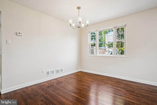 2305 Houston St, Suitland, MD 20746 - spare room featuring a chandelier and wood finished floors