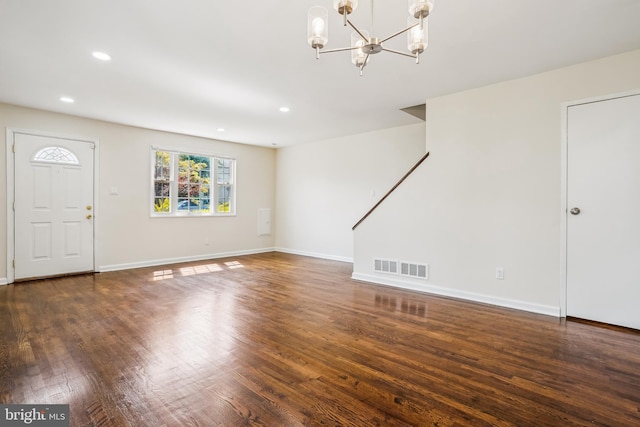 2305 Houston St, Suitland, MD 20746 - unfurnished living room featuring wood finished floors, a chandelier, and recessed lighting
