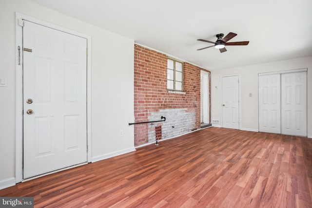 2305 Houston St, Suitland, MD 20746 - unfurnished living room with a ceiling fan and wood finished floors