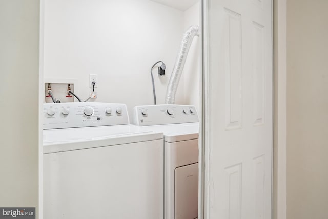 2305 Houston St, Suitland, MD 20746 - washroom with washer and clothes dryer