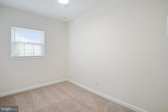 2305 Houston St, Suitland, MD 20746 - carpeted spare room featuring baseboards and ceiling fan