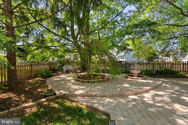 exterior space with a fenced backyard