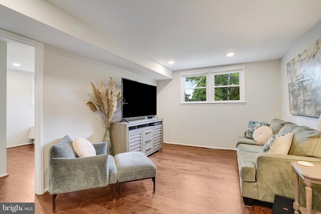 4705 Exeter St, Annandale, VA 22003 - living area with wood finished floors, baseboards, and recessed lighting