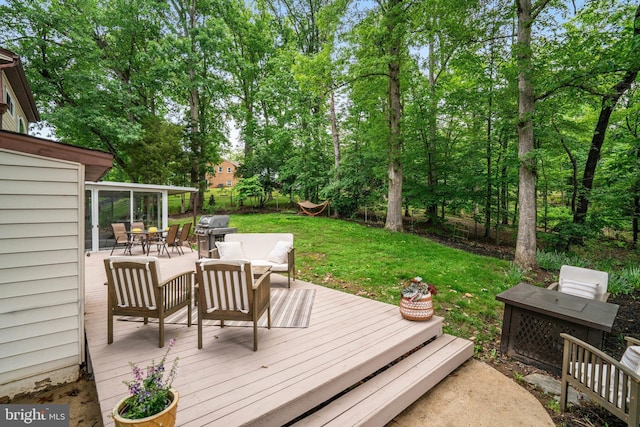 4705 Exeter St, Annandale, VA 22003 - deck with grilling area, outdoor dining area, a yard, and an outdoor living space