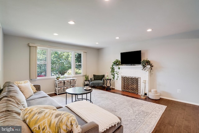 4705 Exeter St, Annandale, VA 22003 - living area with baseboards, wood finished floors, recessed lighting, and a fireplace