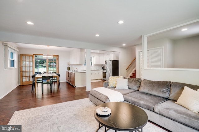 4705 Exeter St, Annandale, VA 22003 - living room with dark wood-type flooring, recessed lighting, stairway, and baseboards
