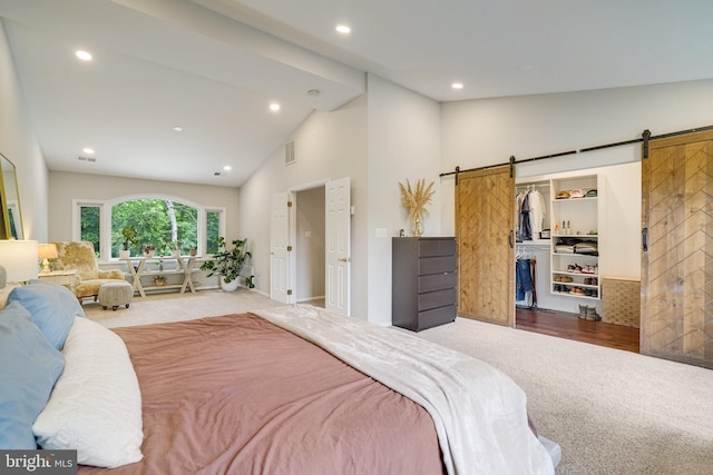 4705 Exeter St, Annandale, VA 22003 - bedroom featuring a barn door, carpet, recessed lighting, high vaulted ceiling, and a spacious closet
