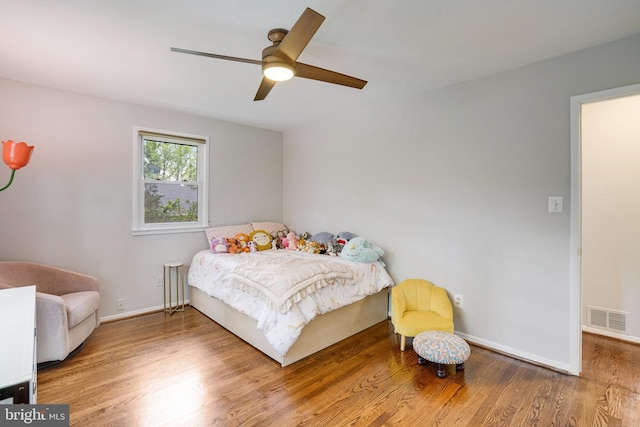 4705 Exeter St, Annandale, VA 22003 - bedroom with wood finished floors, baseboards, and a ceiling fan