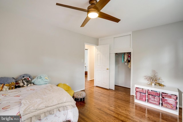 4705 Exeter St, Annandale, VA 22003 - bedroom featuring wood finished floors, a closet, a ceiling fan, and baseboards