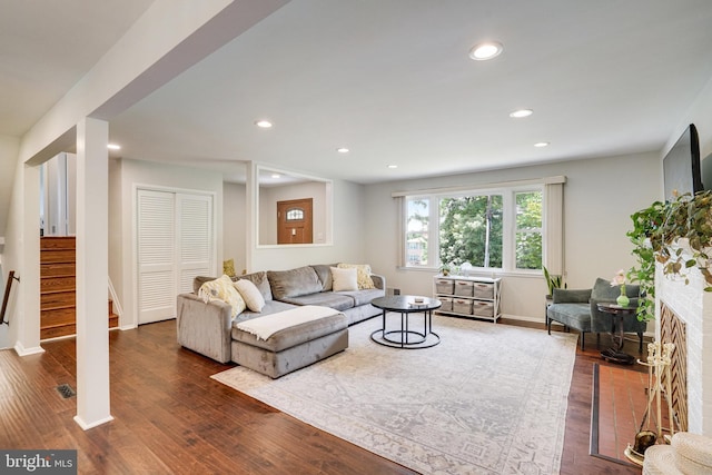 4705 Exeter St, Annandale, VA 22003 - living room with stairway, recessed lighting, wood finished floors, and baseboards