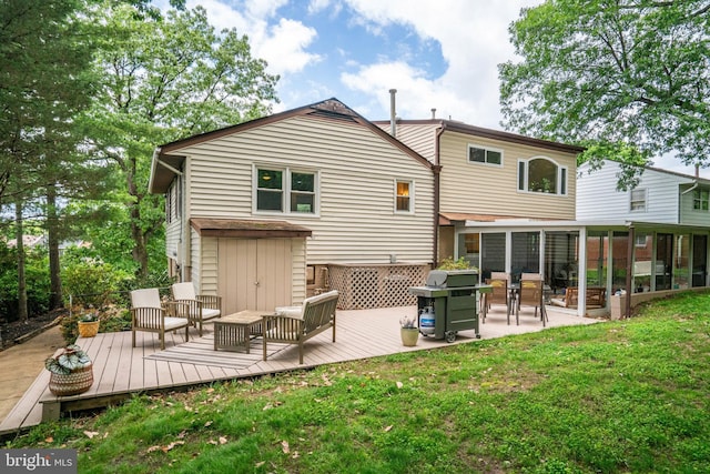 4705 Exeter St, Annandale, VA 22003 - back of property featuring a sunroom, a deck, and a yard