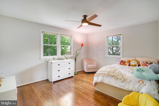 4705 Exeter St, Annandale, VA 22003 - bedroom with wood finished floors, baseboards, and a ceiling fan