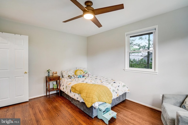 4705 Exeter St, Annandale, VA 22003 - bedroom featuring baseboards, wood finished floors, and a ceiling fan