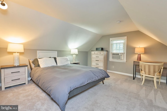 carpeted bedroom with cooling unit, baseboards, and lofted ceiling