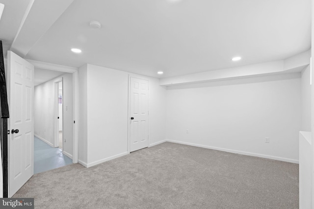 finished below grade area featuring recessed lighting and carpet floors