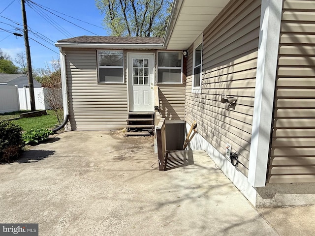 view of patio featuring fence and entry steps