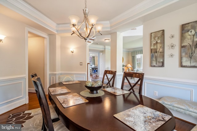 3716 Taft Ave, Alexandria, VA 22304 - dining area with an inviting chandelier, crown molding, a wainscoted wall, and wood finished floors