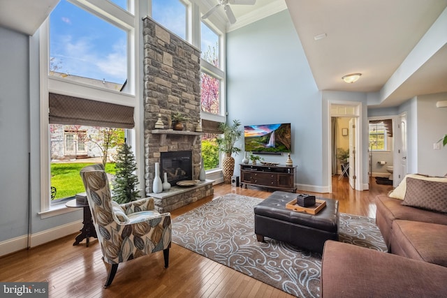 3716 Taft Ave, Alexandria, VA 22304 - living area with a towering ceiling, baseboards, and wood-type flooring