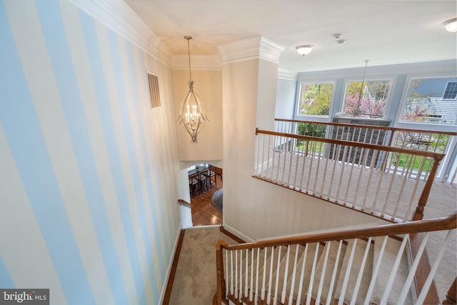 3716 Taft Ave, Alexandria, VA 22304 - staircase with visible vents, crown molding, baseboards, carpet flooring, and a notable chandelier