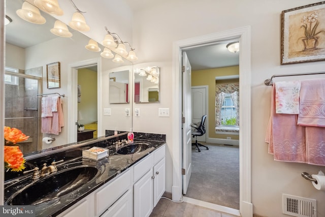 3716 Taft Ave, Alexandria, VA 22304 - bathroom featuring visible vents, a sink, double vanity, and a stall shower