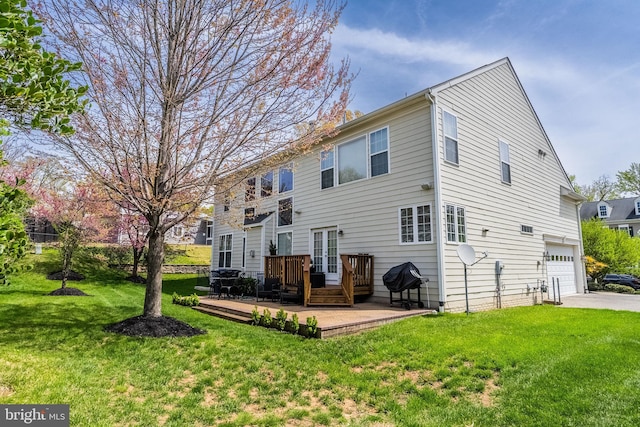 3716 Taft Ave, Alexandria, VA 22304 - rear view of property featuring a wooden deck, driveway, a yard, and a garage