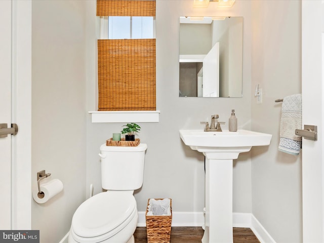 551 Timbermill Ct, Emmitsburg, MD 21727 - bathroom with wood finished floors, toilet, baseboards, and a sink