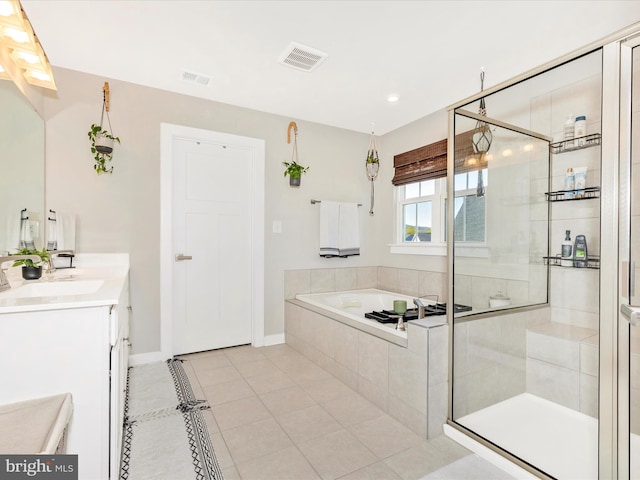 551 Timbermill Ct, Emmitsburg, MD 21727 - full bathroom featuring tile patterned flooring, visible vents, vanity, a garden tub, and a stall shower