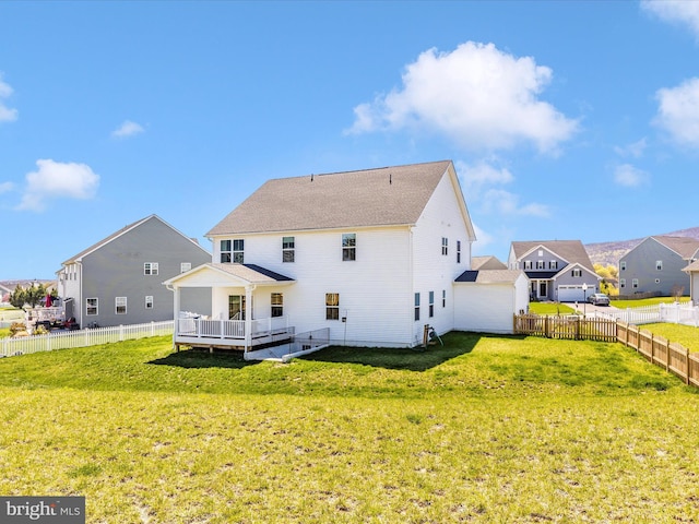 551 Timbermill Ct, Emmitsburg, MD 21727 - back of house featuring a lawn, a wooden deck, and a fenced backyard