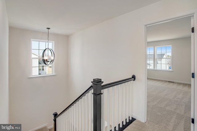 224 Camwood Ct, Fredericksburg, VA 22405 - stairs featuring carpet floors, baseboards, a notable chandelier, and visible vents